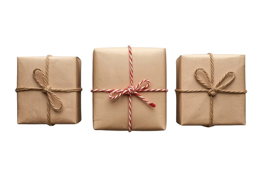 Three brown paper parcels tied with simple natural twine