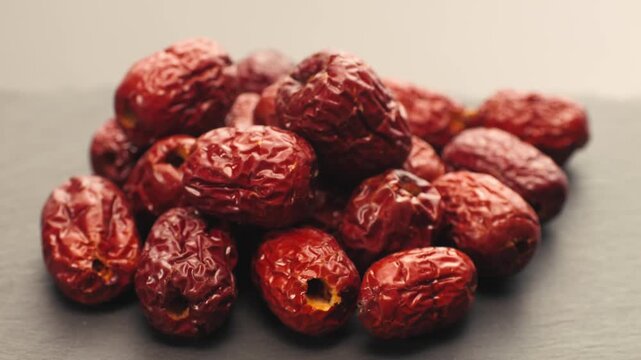 Red date and dried chili pepper, chinese jujube dried dates and hot red chili for sichuan hot pot soup, asian spicy ingredient and dried fruit close up