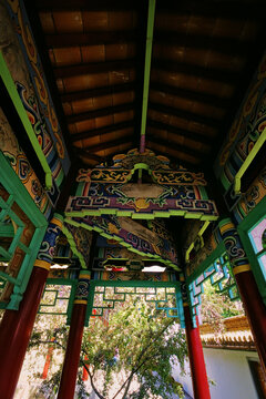 Looking up at painted beams of a Chinese pavilion, Chinese Garden Zurich, Switzerland