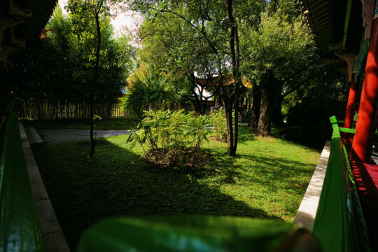 Garden path along a red pavilion railing, Chinese Garden Zurich, Switzerland