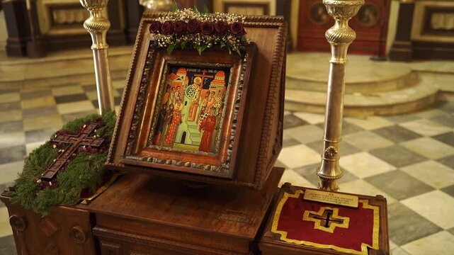 Orthodox church decor. Ornate religious setting with candles and icons