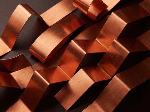 Curved copper ribbons in an abstract geometric composition with metallic texture and soft highlights against a dark background for industrial design
