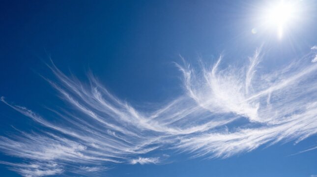 Wispy Cirrus Clouds in Bright Blue Sunny Sky