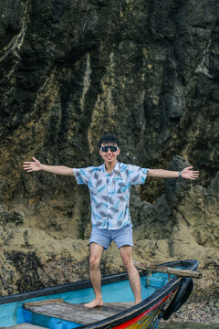Smiling Tourist Wearing Sunglasses Open His Arms Wide
