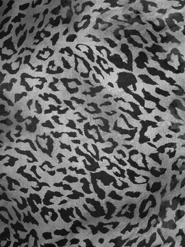Black and white leopard print fabric texture background