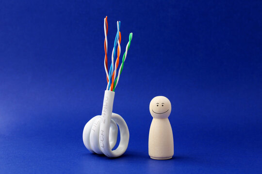 A happy person next to a Category 5e UTP (unshielded twisted pair) network cable, ideal for Ethernet networks