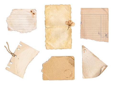 Various old torn vintage paper pieces with aged texture and stains