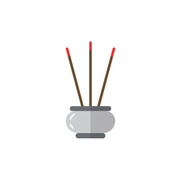 Incense Sticks Burning in a Holder.