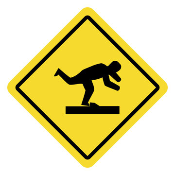 Warning sign depicting a person slipping on a surface.