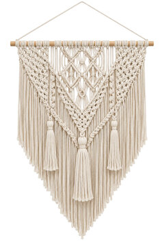 Handmade macrame wall hanging with intricate woven patterns and decorative cotton tassels on wood
