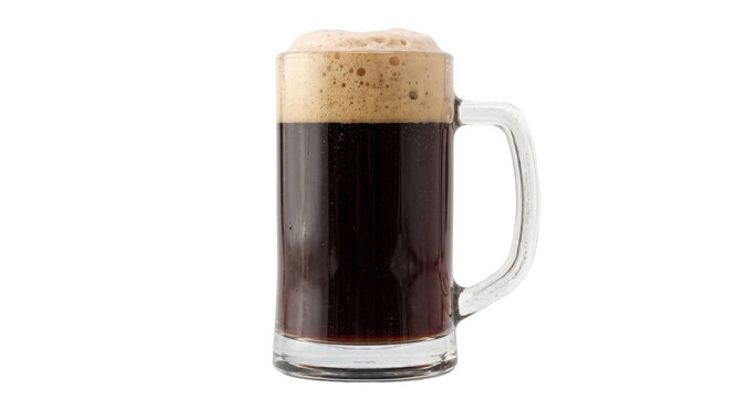 A glass mug of dark stout beer topped with thick foam, isolated against a black background