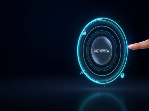 A finger touching a glowing digital interface button with the text 2027 review, representing business planning and future analysis