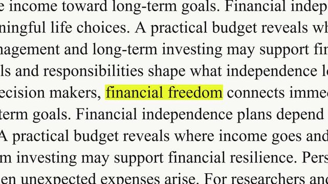 The phrase financial freedom appears in a yellow highlight as black serif paragraphs change, with text about income, budgets and expenses on a white background.
