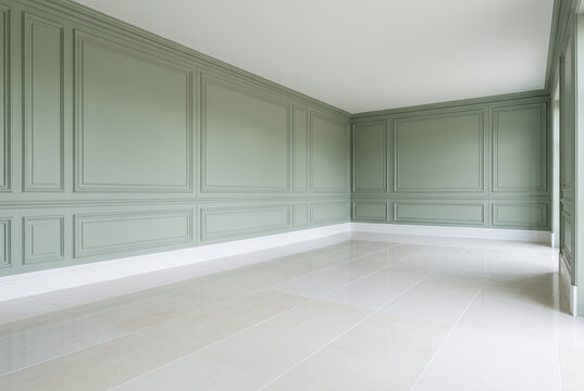 Empty classic room with sage paneled walls and glossy tiles