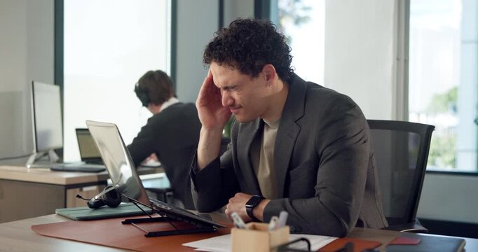 Businessman, headache and laptop with stress in office for pressure, deadline or difficult task. Frustrated, man or employee with sore pain, migraine or brain fog for tension or fatigue in workplace