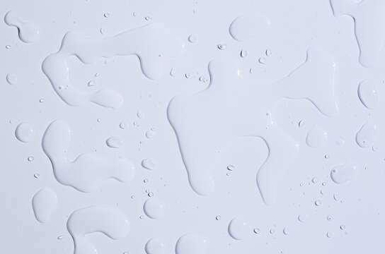 Micellar water background. A cosmetic product for facial care.