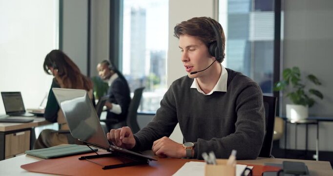 Man, consultant or laptop with headset in office for virtual assistance, communication or support. Male person, agent or talking with mic on computer for online service or helpful advice in workplace