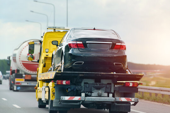 Roadside assistance helping a driver with a broken car