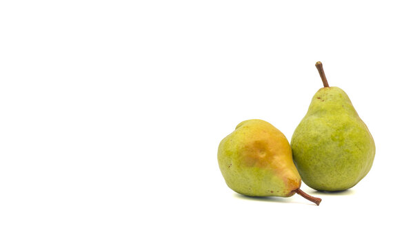 Two fresh green pears on a white background   