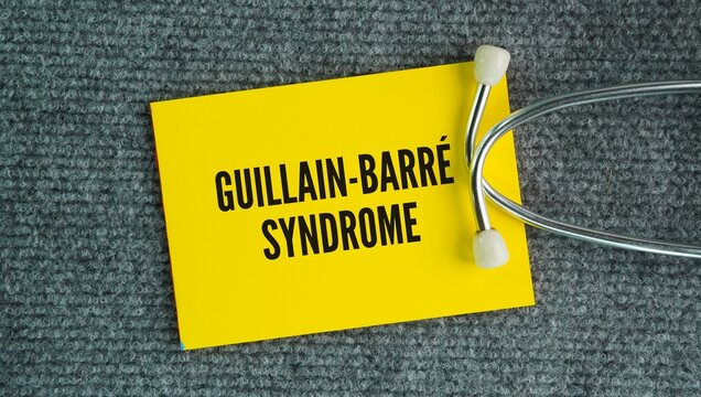 Stethoscope and paper with the words Guillain-Barr&eacute; syndrome GBS is a rare, serious autoimmune disorder in which the body's immune system mistakenly attacks the peripheral nervous system