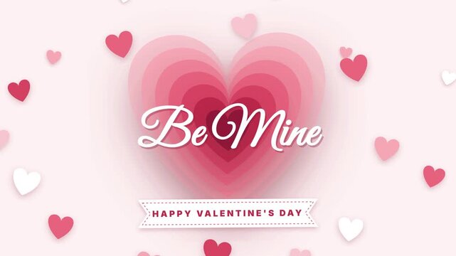 Pastel paper hearts stack layer by layer into a deep layered heart with soft shadows, paper hearts pop in around it and Be Mine appears with a Happy Valentine&rsquo;s Day ribbon.