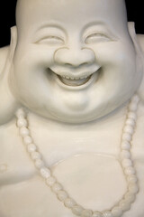 Laughing Buddha sculpture © Julia