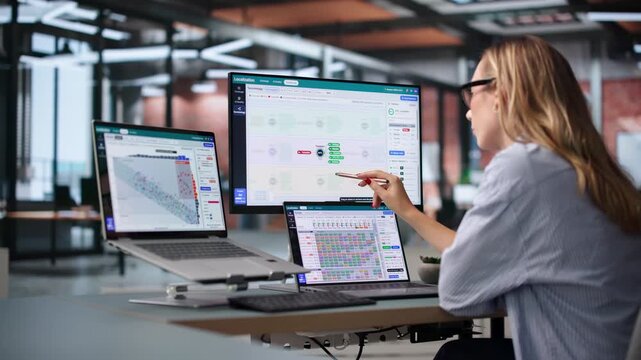 Project Manager Reviews Multilingual Content On Laptop