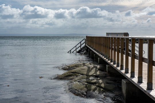 Wooden jetty for swimming in the ocean