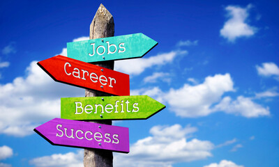 Jobs, career, benefits, success - wooden signpost with four arrows, sky with clouds © PX Media