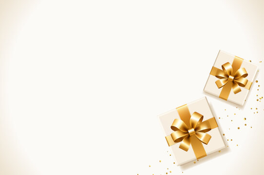  Luxury gift background with white gift boxes gold ribbons and confetti top view with copy space