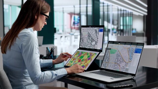 Urban Planner Studies Zoning Maps