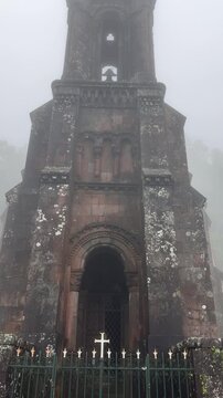 Chapel of nossa senhora das vitorias emerging from mist