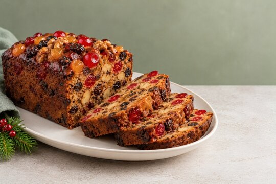 Christmas fruitcake slices with candied cherries and nuts