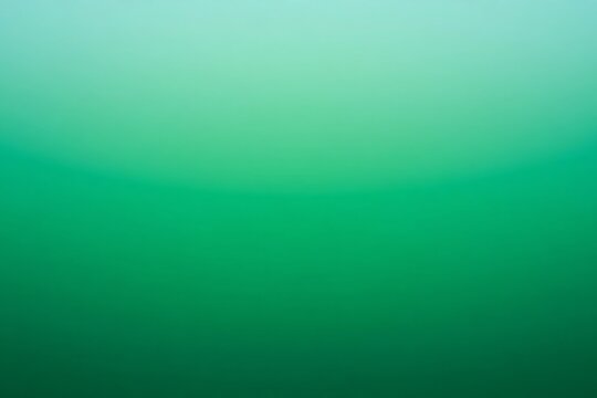 Abstract smooth green gradient background with soft light transition