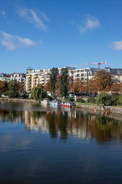 Berlin, Germany; 1st October 2025: Autumn waterfront along the Spree in Berlin's Moabit district with boats and riverside apartments.