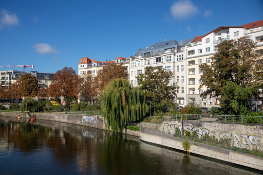 Berlin, Germany; 1st October 2025: Autumn waterfront along the Spree in Berlin's Moabit district with boats and riverside apartments.