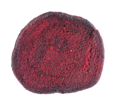 Crispy roasted beetroot chips with sea salt, isolated on white background. Healthy and crunchy natural vegetable snack. Clipping path.