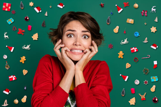Photo of scared woman wear red jumper outfit bite fingernails wacht horror movie big eyes empty space isolated on green color background