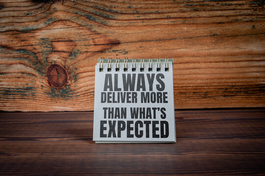 ALWAYS DELIVER MORE THAN WHAT&rsquo;S EXPECTED Message on Spiral Notebook