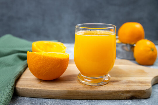 Orange juice freshly squeezed, citrus fruit peel, healthy breakfast drink, antioxidant refreshment beverage, nutrition diet