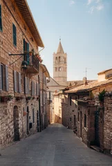 Medieval stone street and Basilica of Santa Chiara bell tower, Assisi, Umbria, Italy © JFL Photography