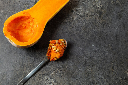 Fresh Butternut Squash with Seeds and Spoon