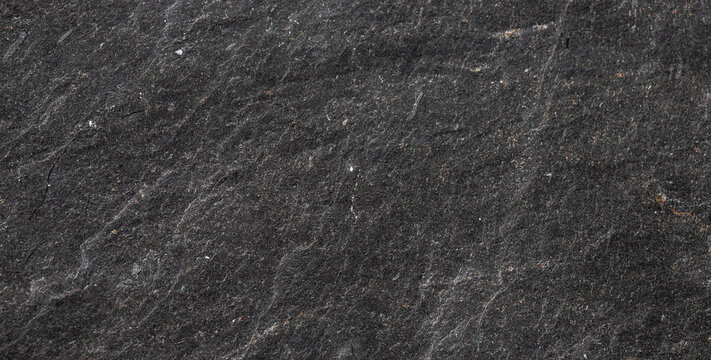 dark grey slate stone texture surface background with rough natural rock pattern