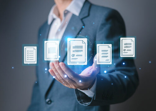 Businessman presenting digital documents through a virtual interface, illustrating document management workflow automation, electronic records and digital transformation in modern business technology.