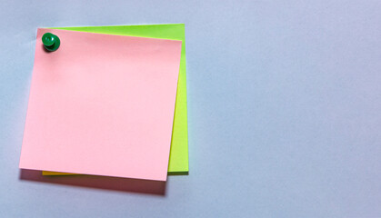 Blank Pink and Green Sticky Notes Pinned to White Background Paper Copy Space © Theja