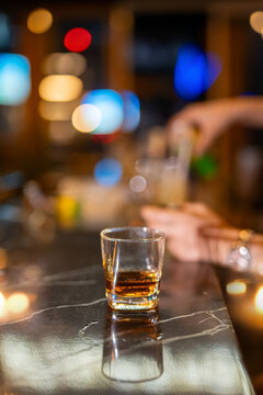 Closeup businessmen holding a glass of whiskey