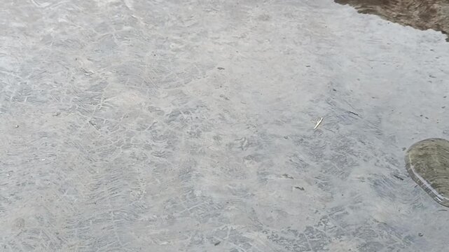 Texture lantai yang terbuat dari semen yang luas.
