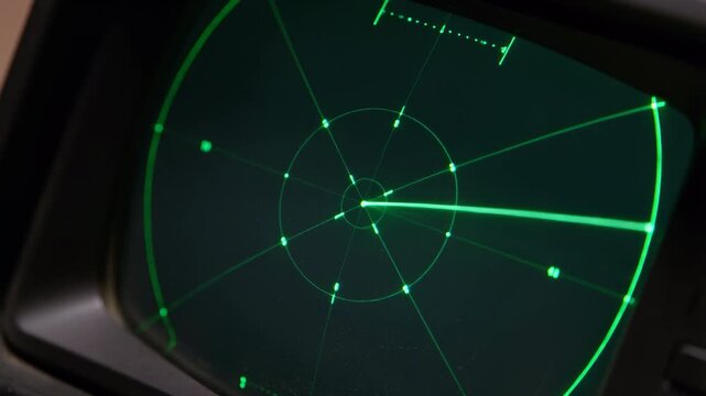 Green radar screen sweep with rotating beam and blips on CRT display 60 FPS