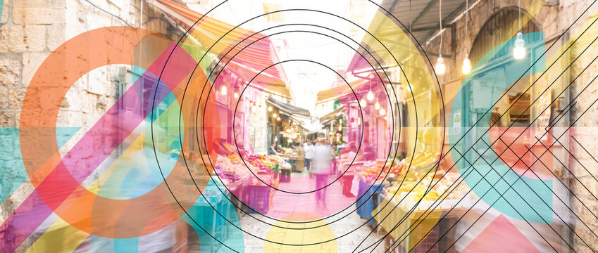 Shoppers browsing fruit stalls in narrow old town market alley with bold geometric overlays
