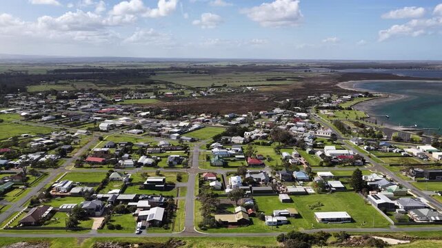 Port Albert, Victoria, Australia &ndash; 4K aerial drone view of historic coastal town, turquoise tidal waterways, marina, extensive sandbars and wetlands along the Gippsland coastline